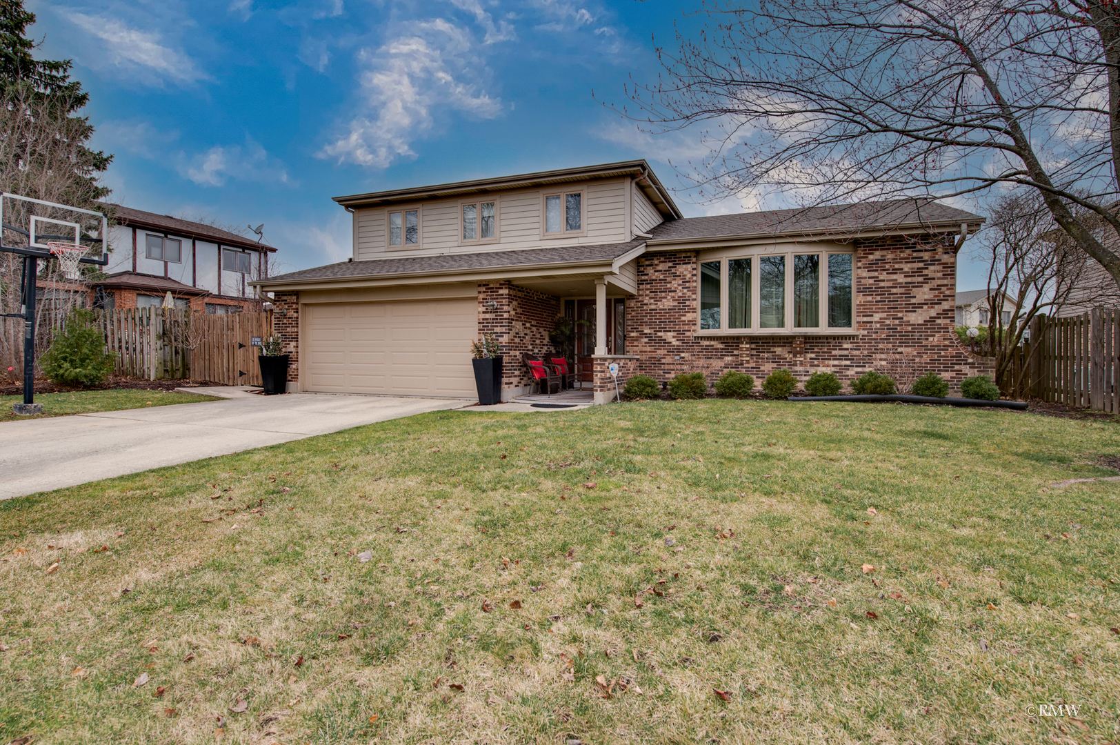 1216 Sable Drive Addison, IL 60101 - Photo 1 of 25 a front view of a house with a yard
