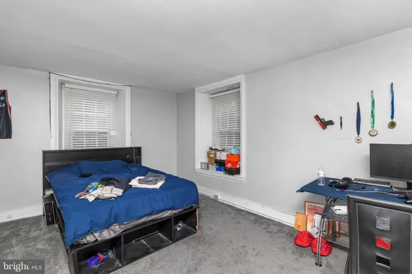 a room with furniture and a wooden floor