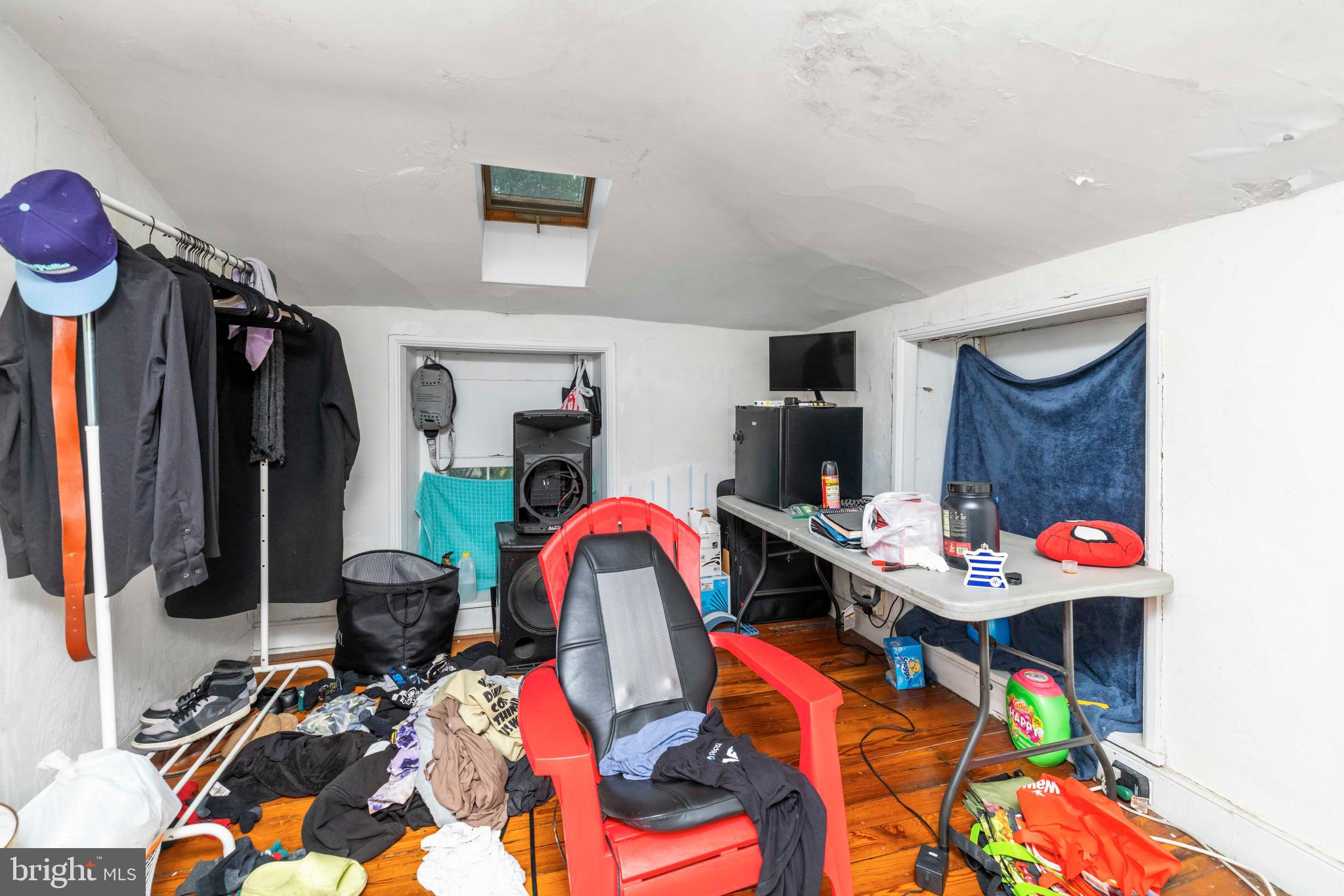 3636 Pine Road Huntingdon Valley, PA 19006 - Photo 20 of 32 a living room with furniture a flat screen tv and a bed