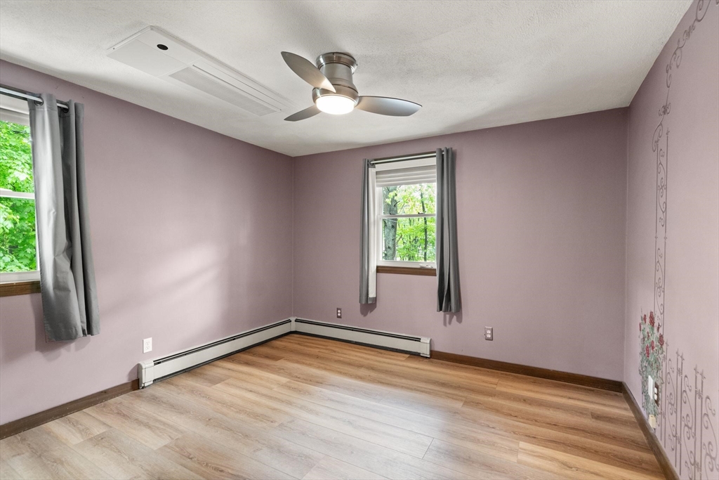 901 Haverhill Street Rowley, MA 01969 - Photo 21 of 42 an empty room with a empty space and windows