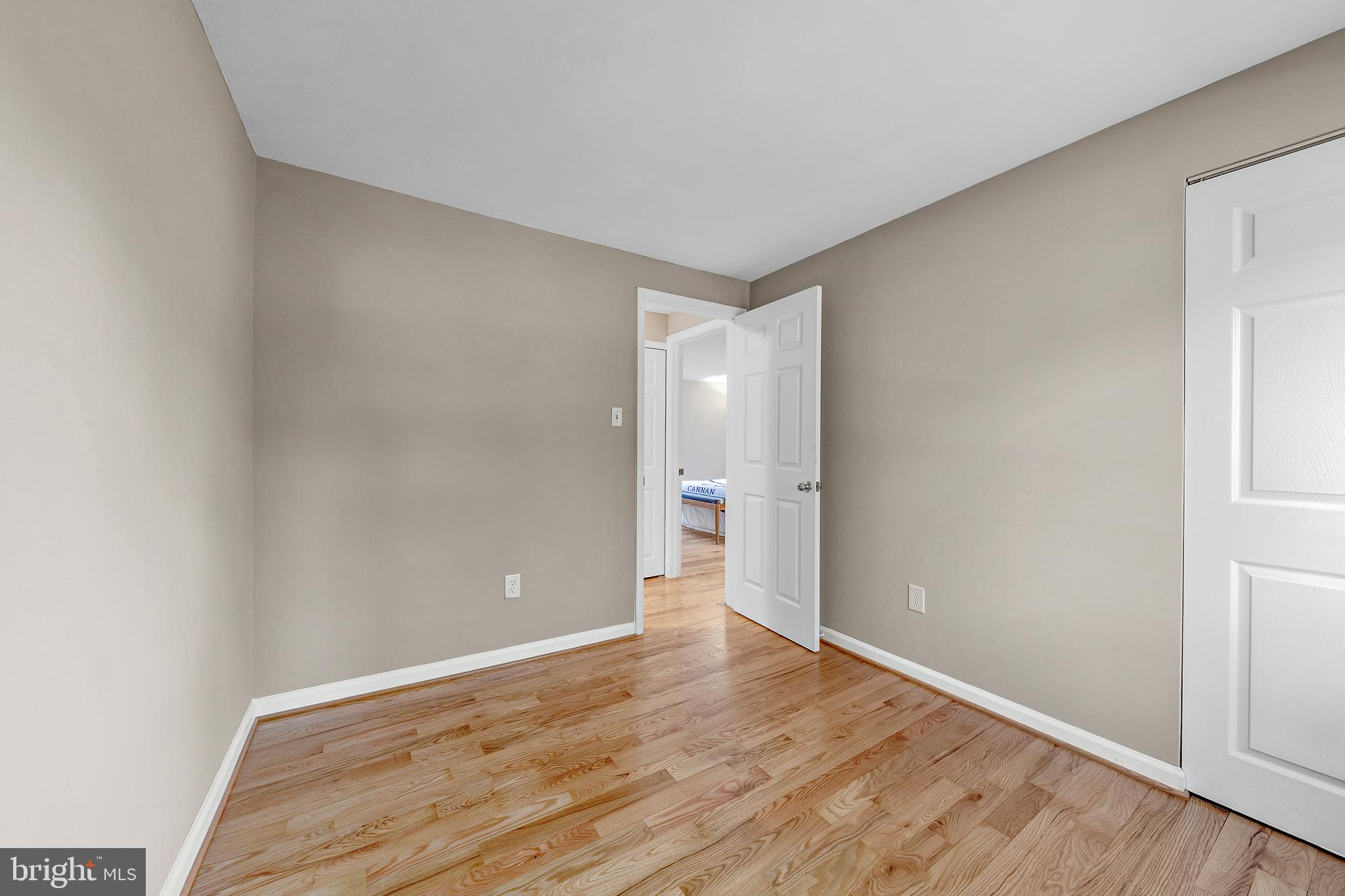 12772 Bradwell Road Herndon, VA 20171 - Photo 25 of 43 a view of an empty room with wooden floor