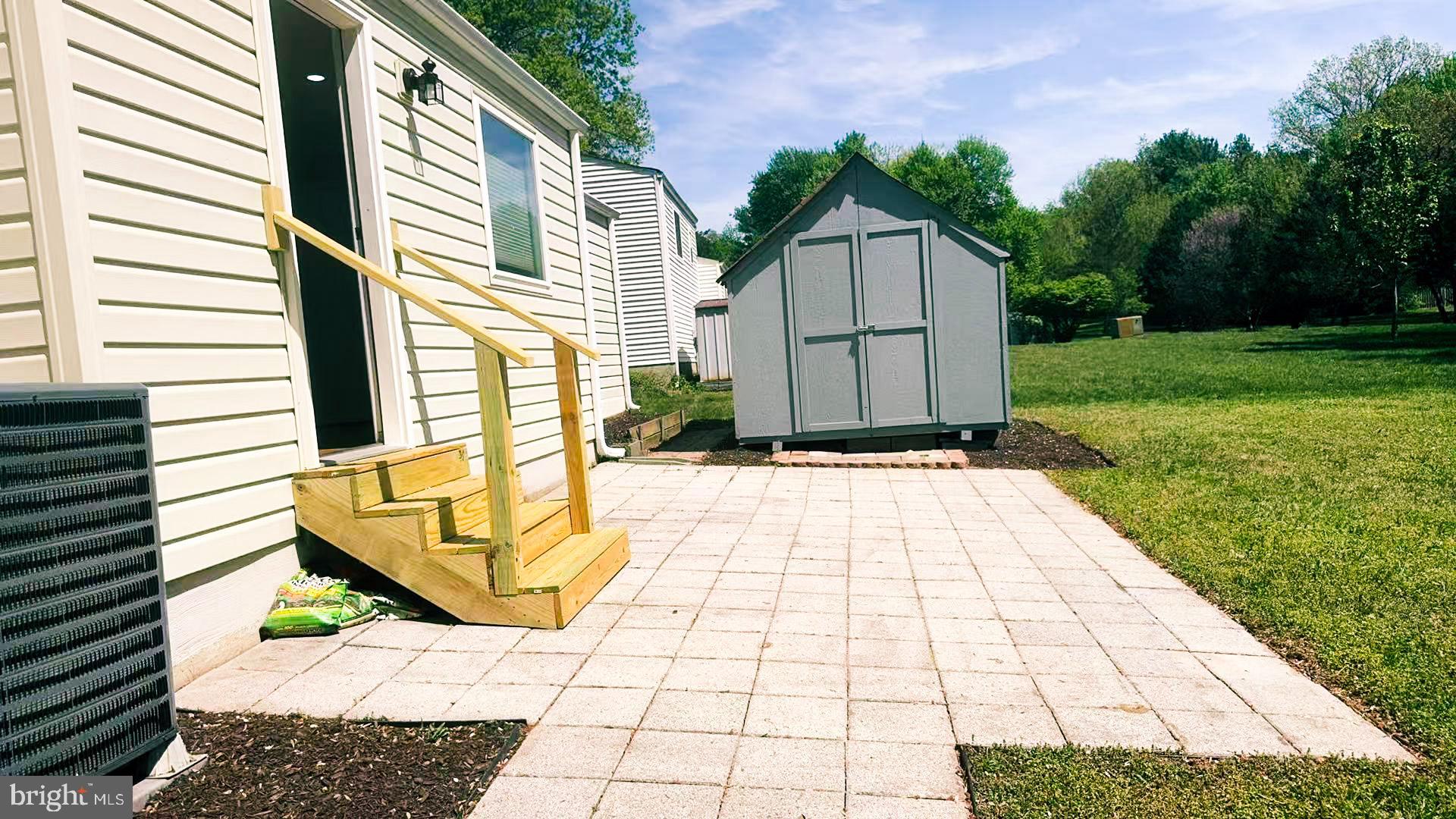 12772 Bradwell Road Herndon, VA 20171 - Photo 33 of 43 a view of a backyard with sitting area