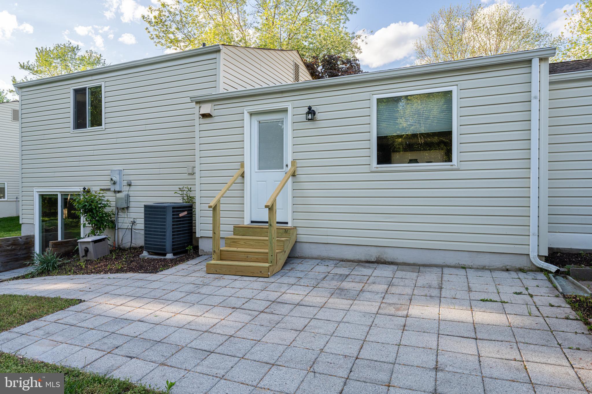 12772 Bradwell Road Herndon, VA 20171 - Photo 34 of 43 a view of house with backyard and sitting area