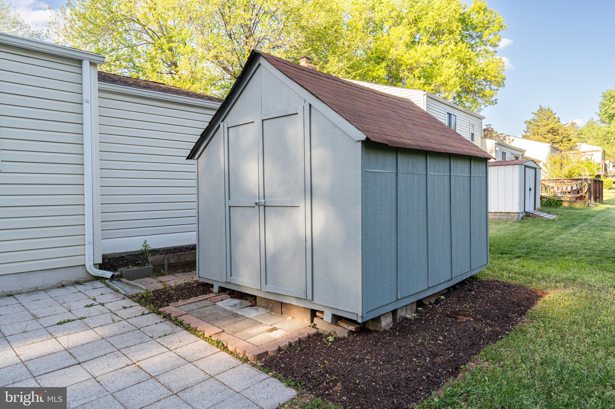 12772 Bradwell Road Herndon, VA 20171 - Photo 35 of 43 a view of a small house with backyard