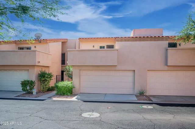front view of a house with a garage