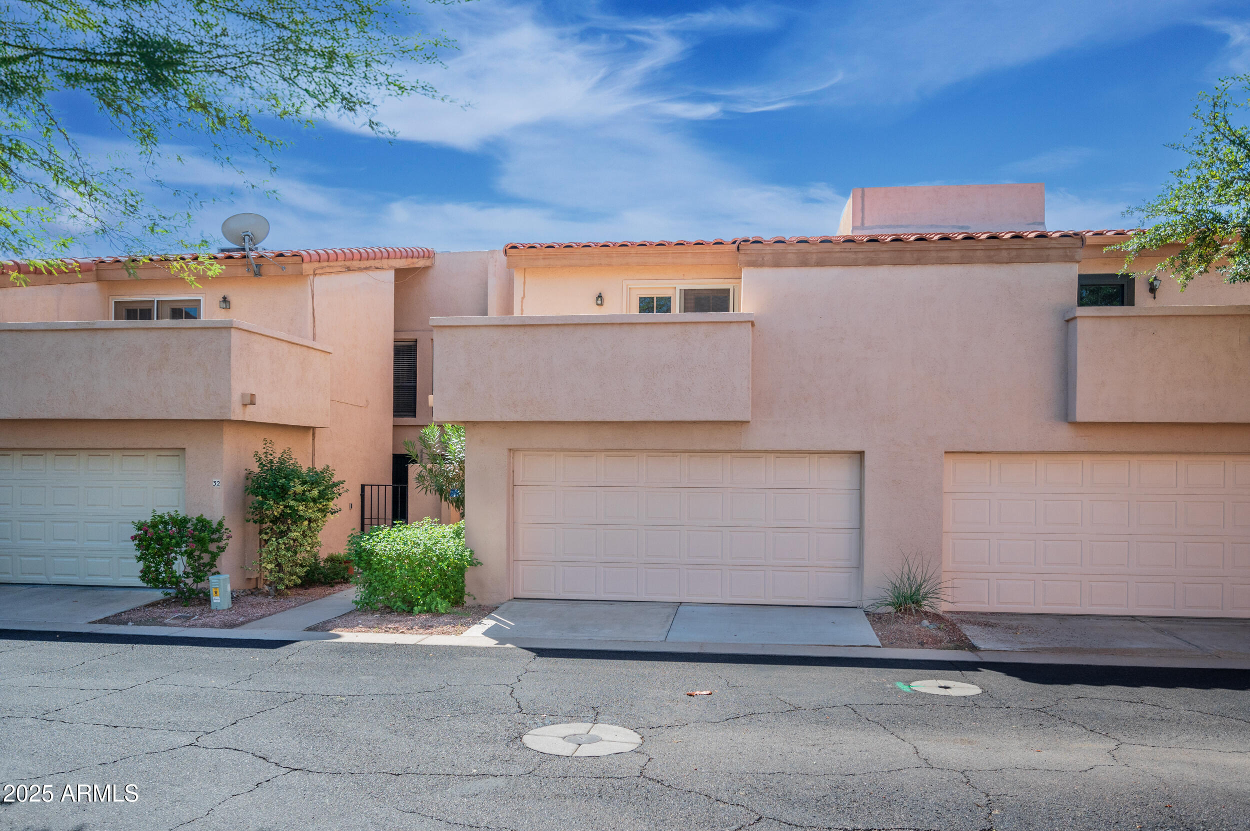 1920 East Maryland Avenue, Unit 31 Phoenix, AZ 85016 - Photo 2 of 43 front view of a house with a garage