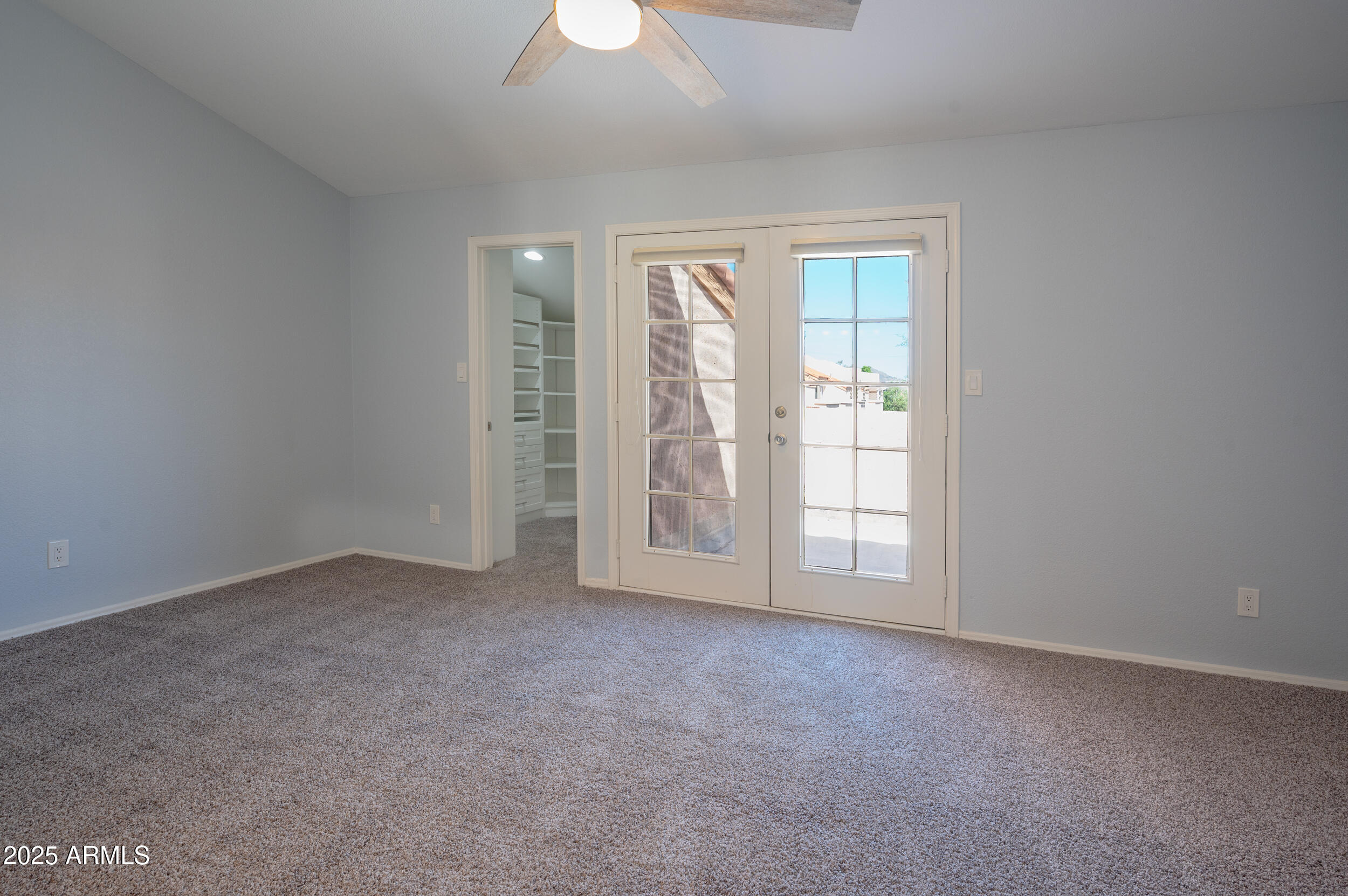 1920 East Maryland Avenue, Unit 31 Phoenix, AZ 85016 - Photo 21 of 43 an empty room with windows
