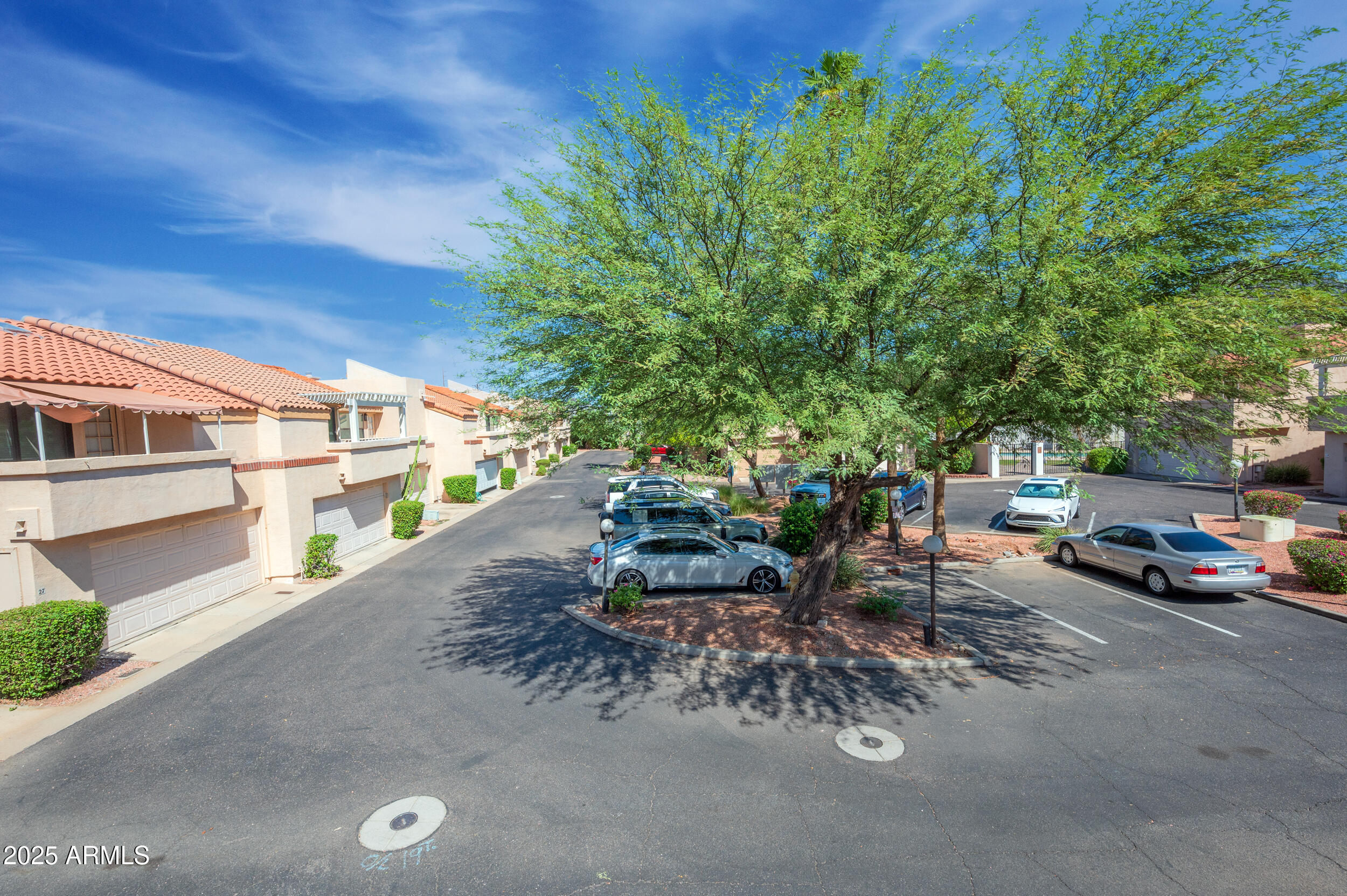 1920 East Maryland Avenue, Unit 31 Phoenix, AZ 85016 - Photo 32 of 43 a view of a street with cars