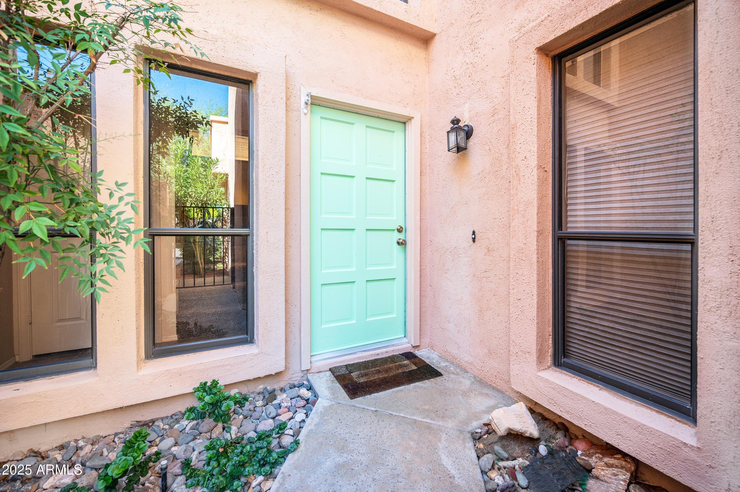 1920 East Maryland Avenue, Unit 31 Phoenix, AZ 85016 - Photo 5 of 43 a front view of a house with a yard