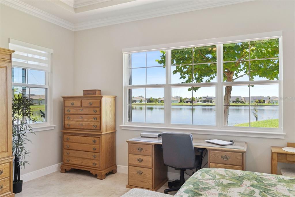 2665 Meadowedge Loop St. Cloud, FL 34772 - Photo 28 of 53 a bedroom with a bed and a dresser