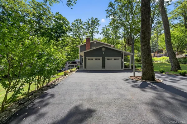 a house with trees in front of it