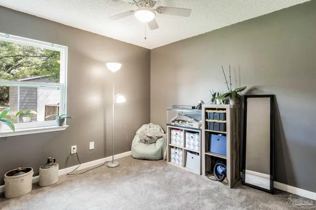 a room with furniture and window