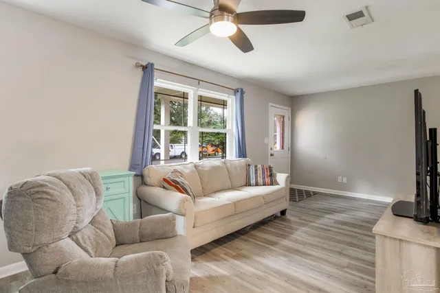 a view of a street with sitting area