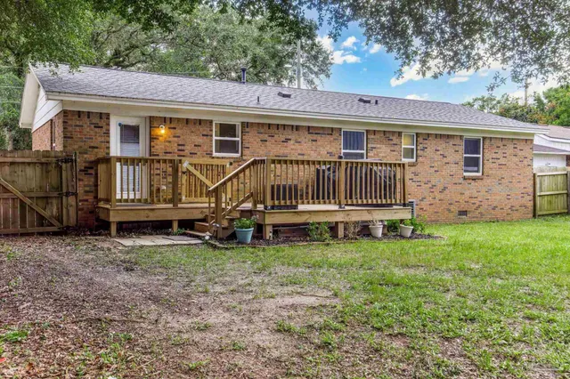 a house view with a garden space