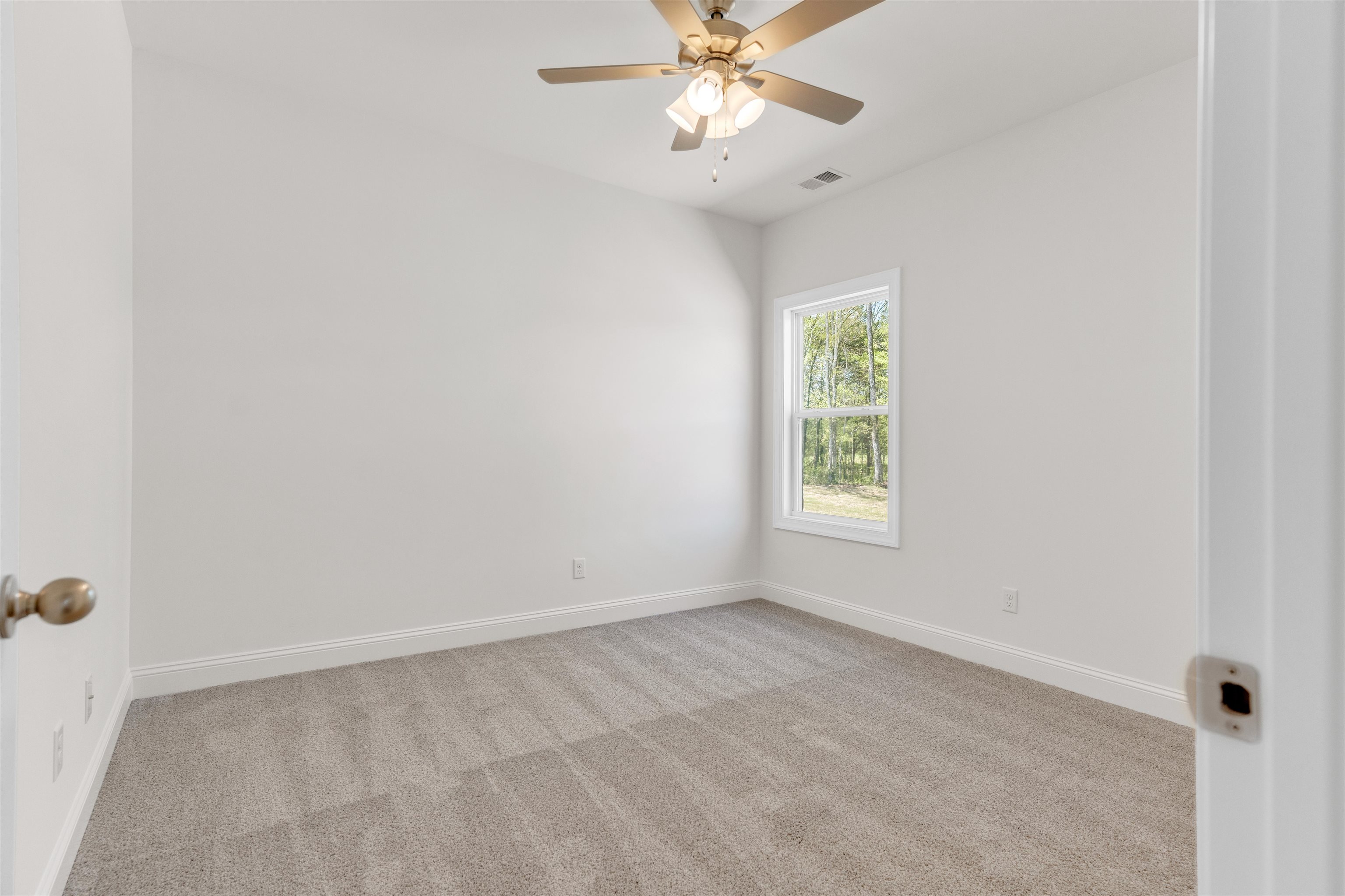 395 Centerline Roper Loop Byhalia, MS 38611 - Photo 11 of 23 a view of an empty room with a window