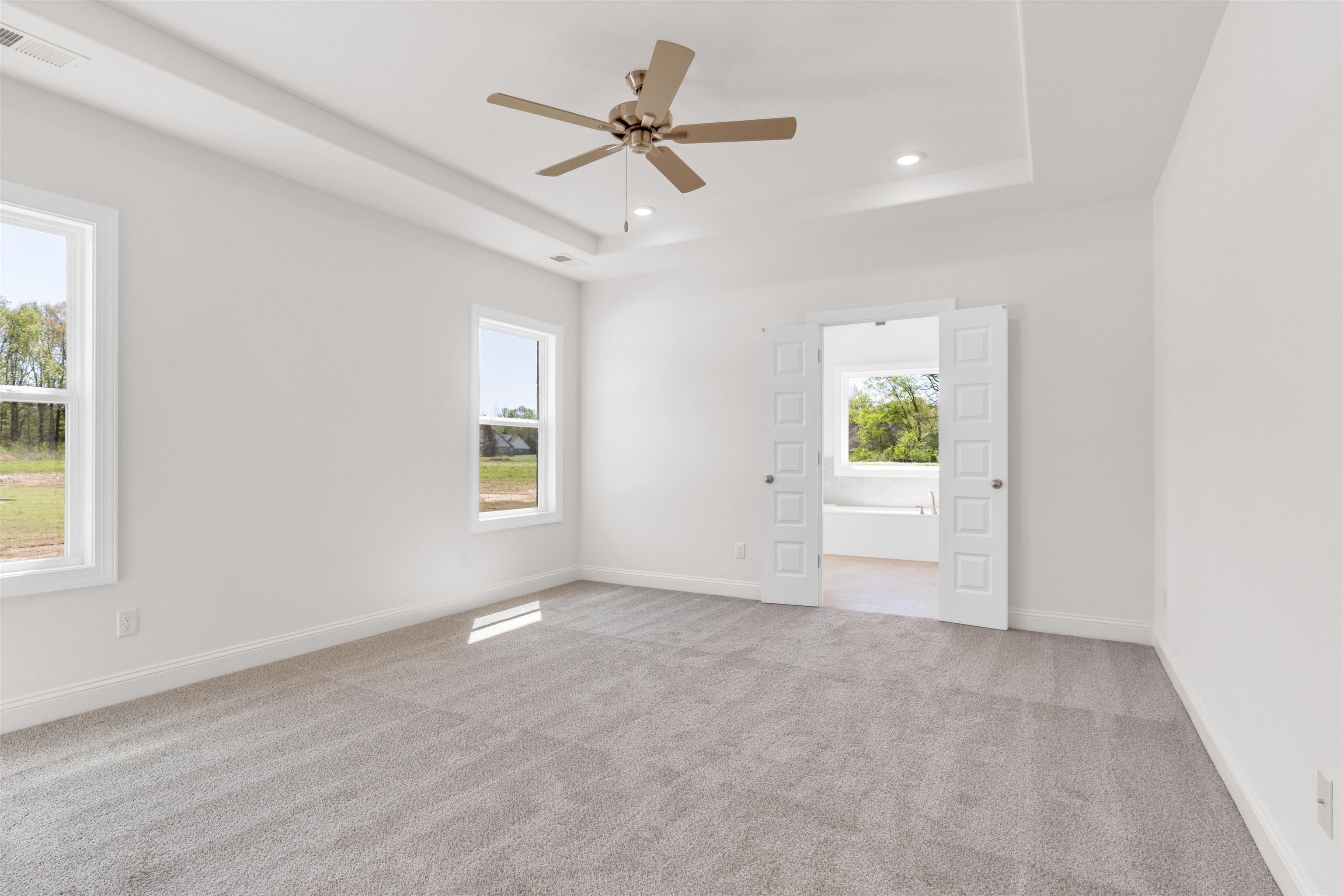 395 Centerline Roper Loop Byhalia, MS 38611 - Photo 14 of 23 an empty room with a window and a ceiling fan