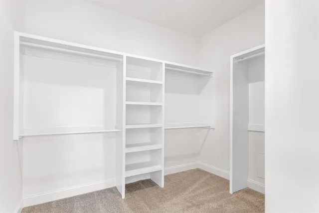a view of an empty walk in closet