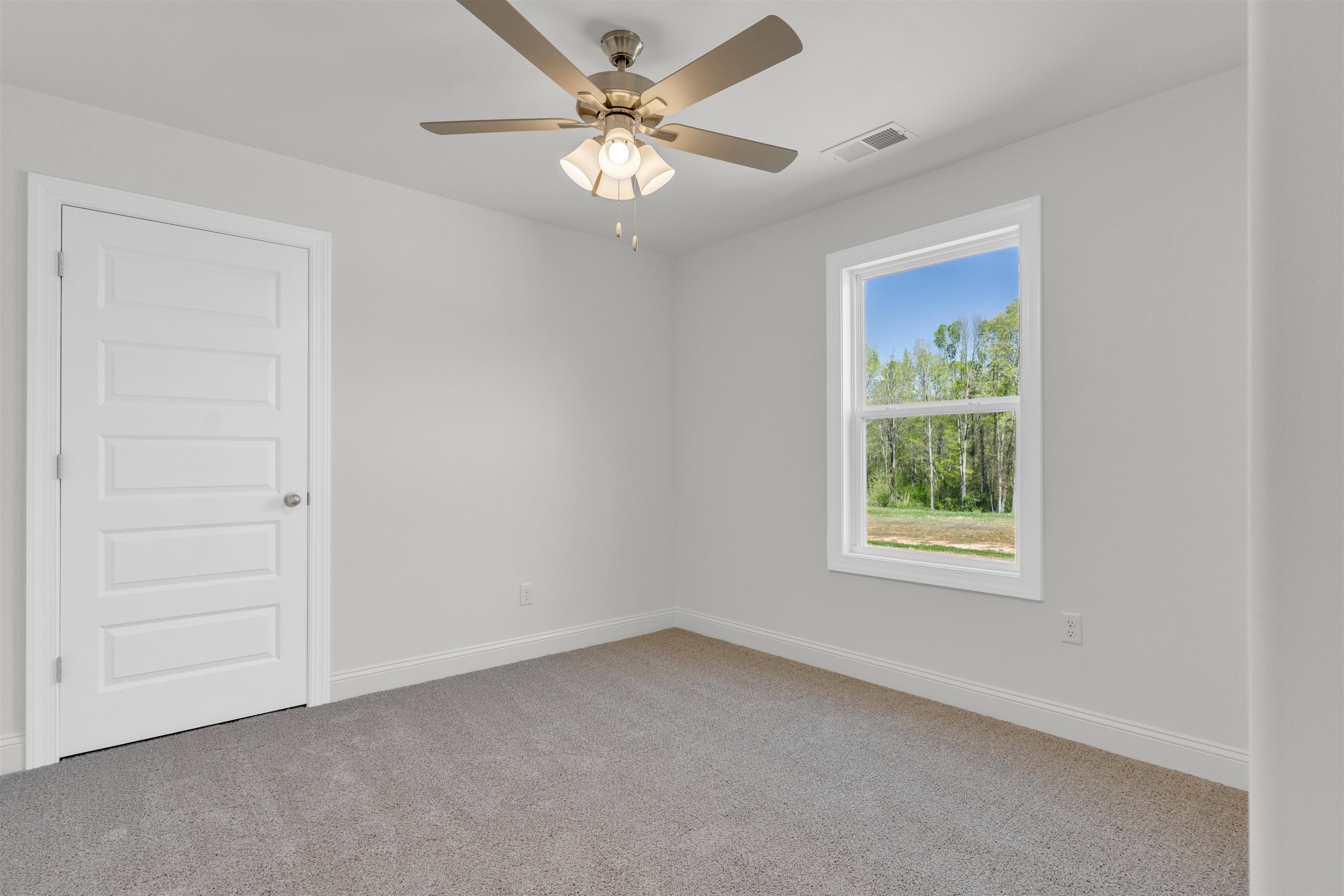 395 Centerline Roper Loop Byhalia, MS 38611 - Photo 23 of 23 an empty room with windows and fan