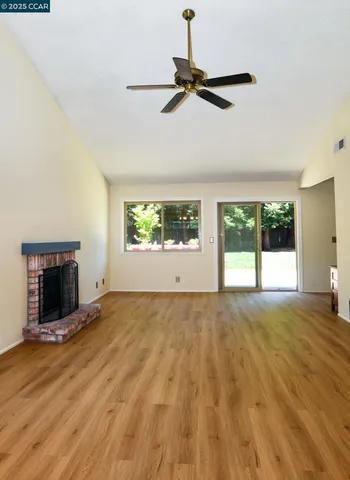 a view of an empty room and window