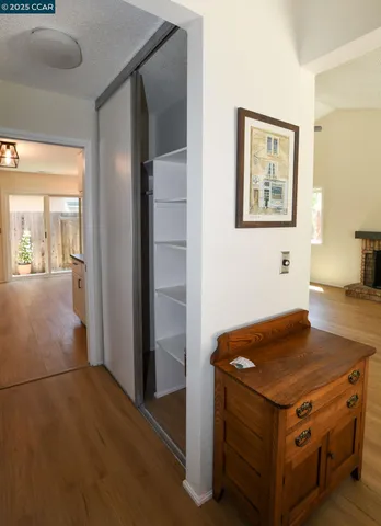 a kitchen with a stove and a refrigerator