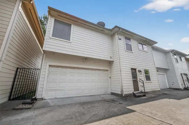 a view of a house with garage