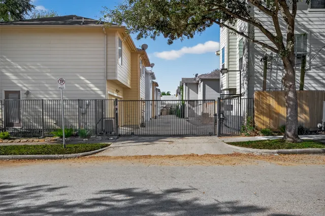 a view of street with large house