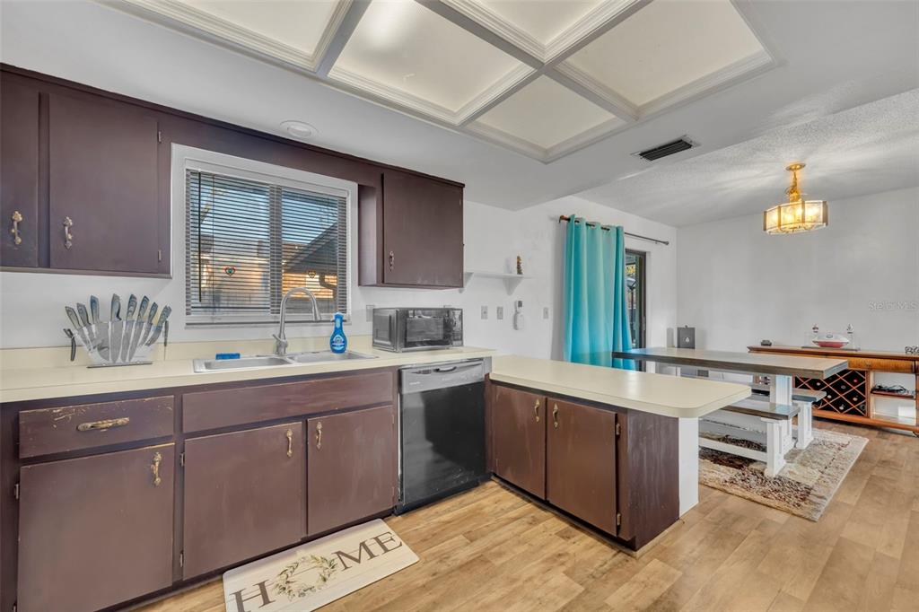 202 Bryan Street Eustis, FL 32726 - Photo 14 of 53 a large white kitchen with a large window