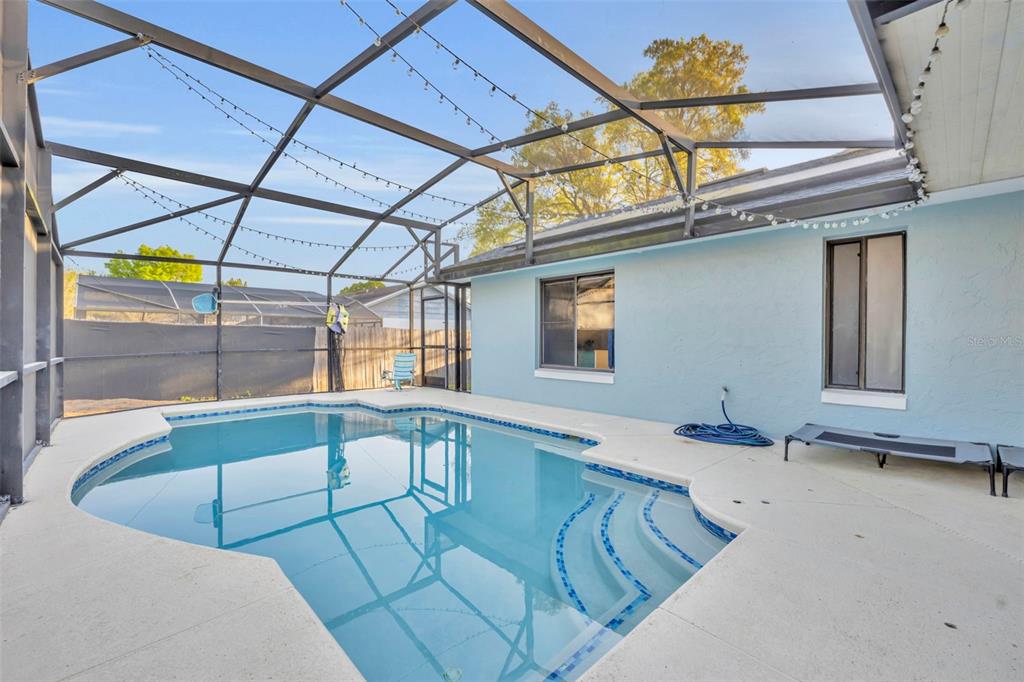 202 Bryan Street Eustis, FL 32726 - Photo 27 of 53 a view of a balcony with furniture and a window