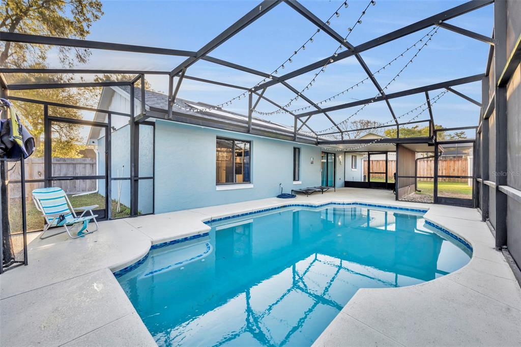 202 Bryan Street Eustis, FL 32726 - Photo 29 of 53 a view of a patio with a table and chairs