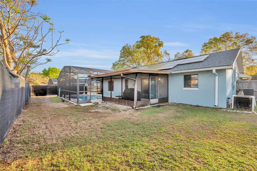 202 Bryan Street Eustis, FL 32726 - Photo 32 of 53 a view of a house with a patio