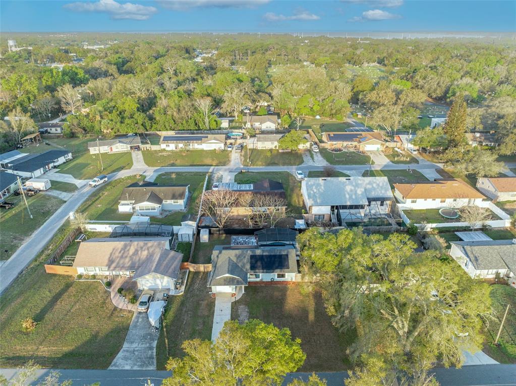 202 Bryan Street Eustis, FL 32726 - Photo 38 of 53 a view of a city with lawn chairs