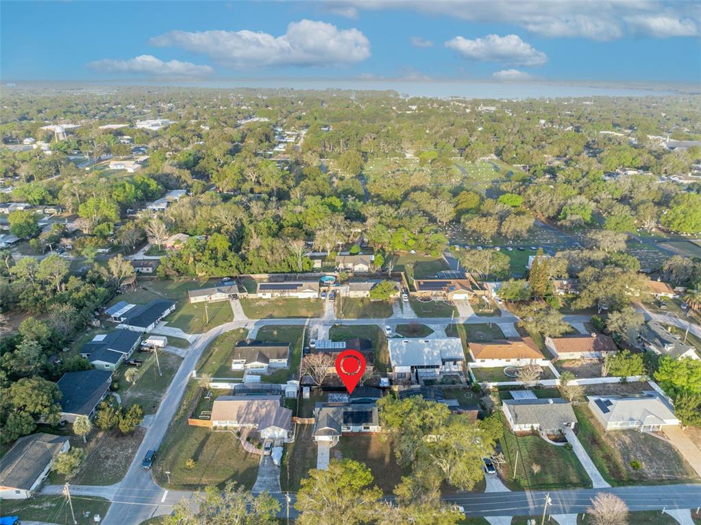 202 Bryan Street Eustis, FL 32726 - Photo 43 of 53 an aerial view of residential houses with outdoor space