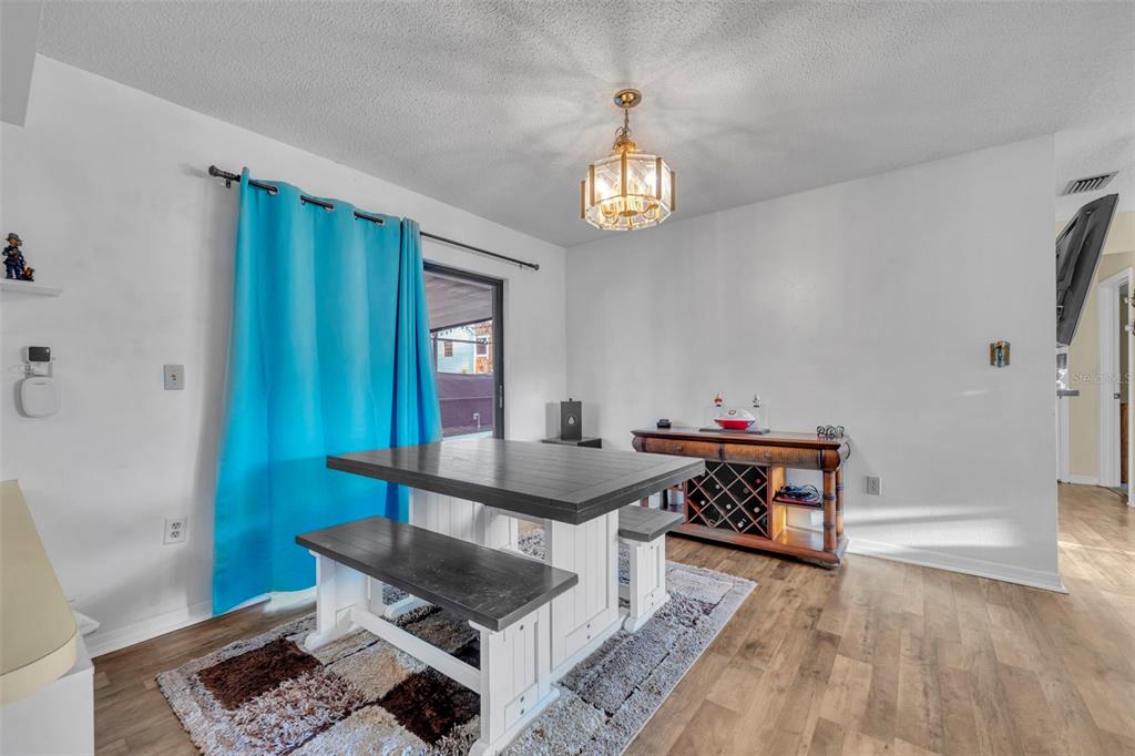 202 Bryan Street Eustis, FL 32726 - Photo 10 of 53 a view of a livingroom with furniture and window