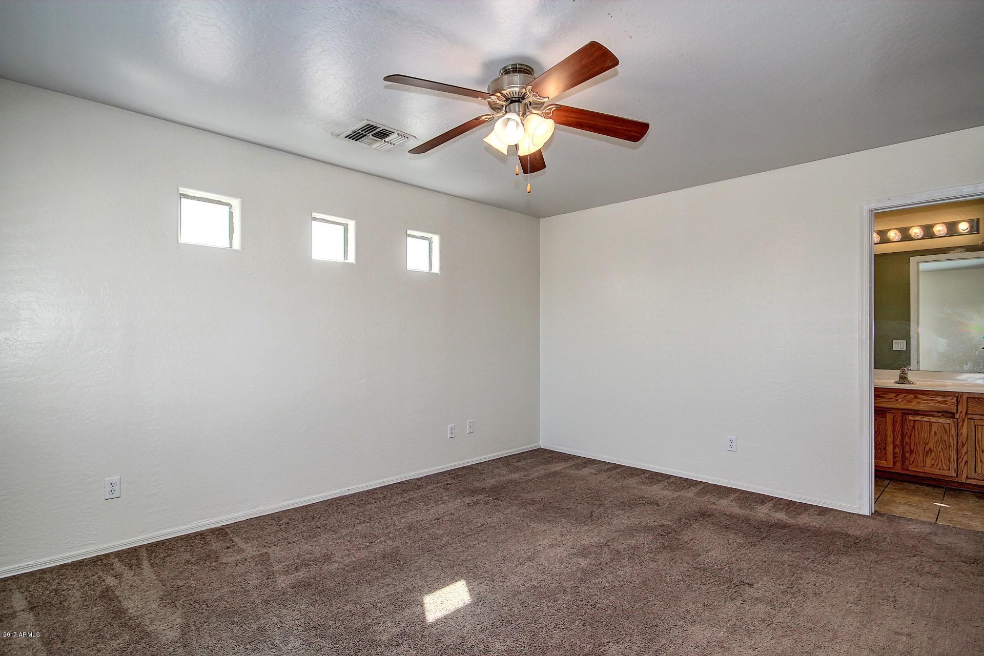 3715 West Carter Road Phoenix, AZ 85041 - Photo 12 of 24 Master Bedroom