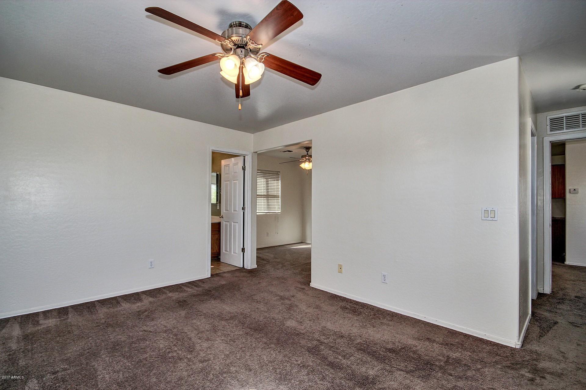 3715 West Carter Road Phoenix, AZ 85041 - Photo 14 of 24 Master Bedroom