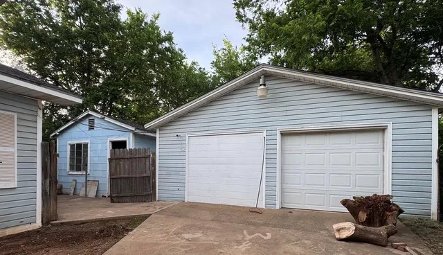 a view of a house with a garage