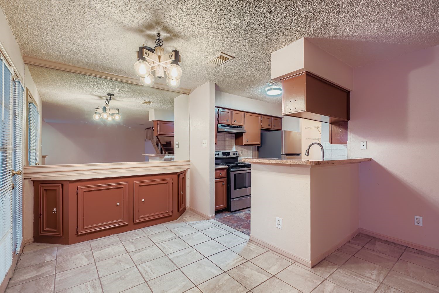3100 Jeanetta Street, Unit 602 Houston, TX 77063 - Photo 10 of 34 a kitchen with a sink and cabinets