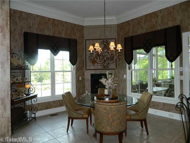 4206 Rock Bridge Road High Point, NC 27262 - Photo 14 of 16 Breakfast. Breakfast Nook overlooks lake and features a fireplace