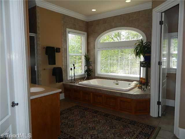 4206 Rock Bridge Road High Point, NC 27262 - Photo 16 of 16 Master Bath/Spa. Master bath jetted tub with heaters and lots of natural sunlight!