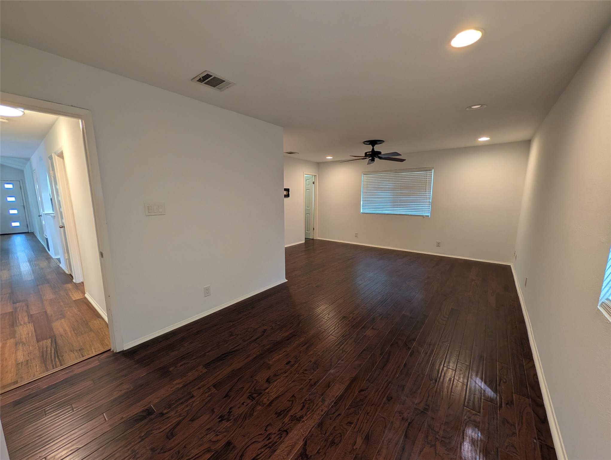 4601 Tamarack Trail Austin, TX 78727 - Photo 16 of 19 Rich hardwood floors and recessed lighting illuminate this adaptable living space, ready for your personal touch.