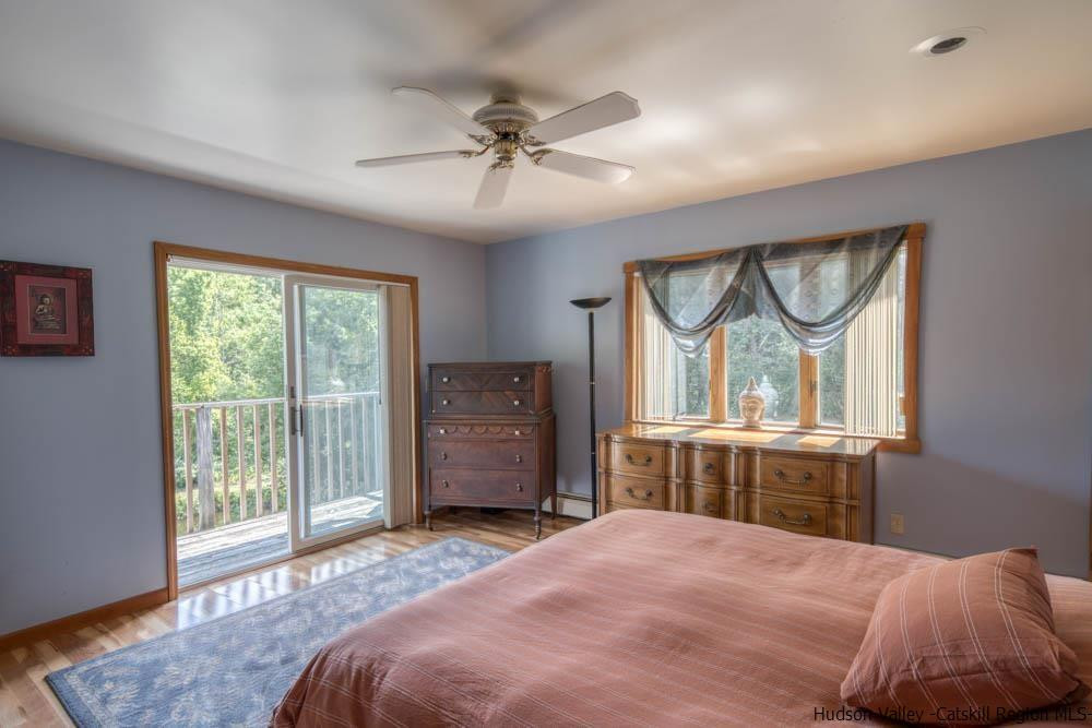 686 Berme Road High Falls, NY 12440 - Photo 13 of 23 a bedroom with a bed and a dresser