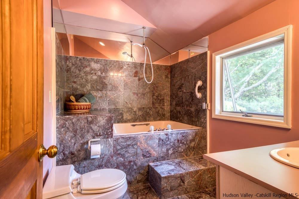 686 Berme Road High Falls, NY 12440 - Photo 17 of 23 a bathroom with a sink and a mirror