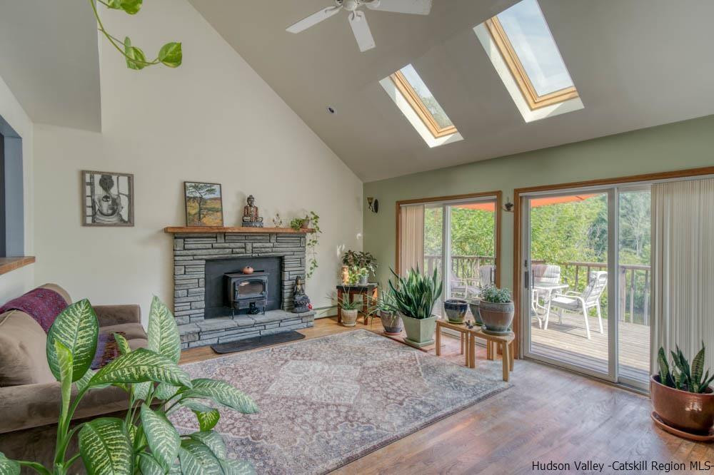 686 Berme Road High Falls, NY 12440 - Photo 4 of 23 a living room with furniture and a fireplace