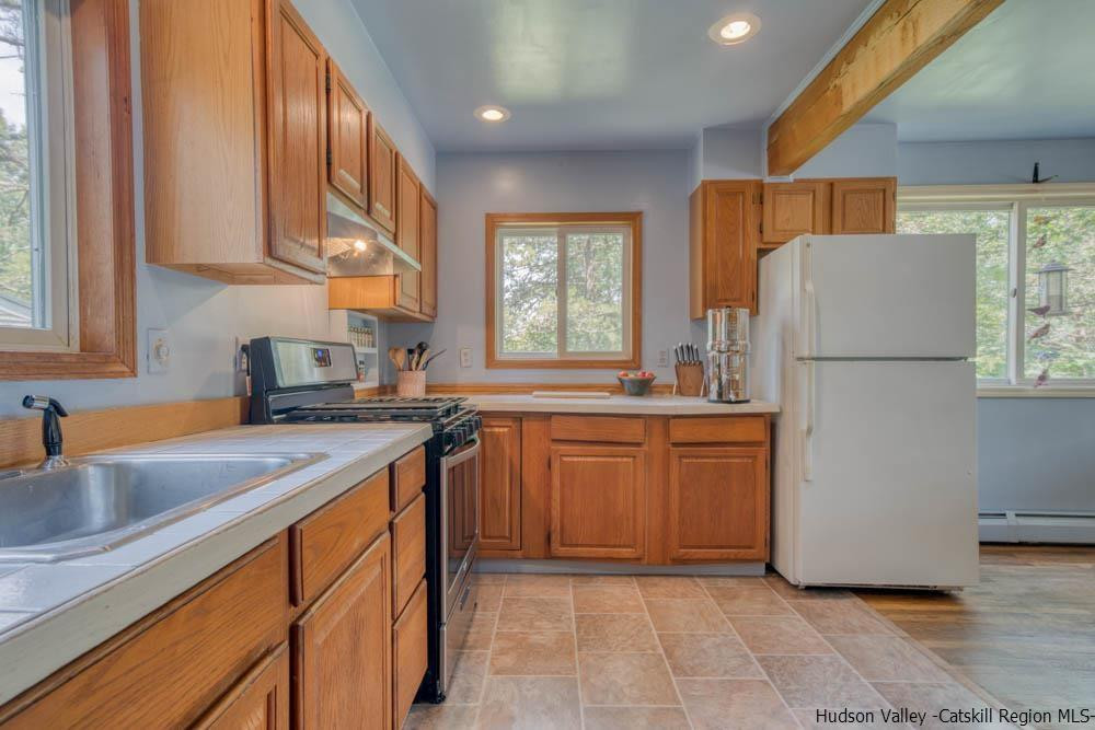 686 Berme Road High Falls, NY 12440 - Photo 8 of 23 a kitchen with sink a refrigerator and a sink