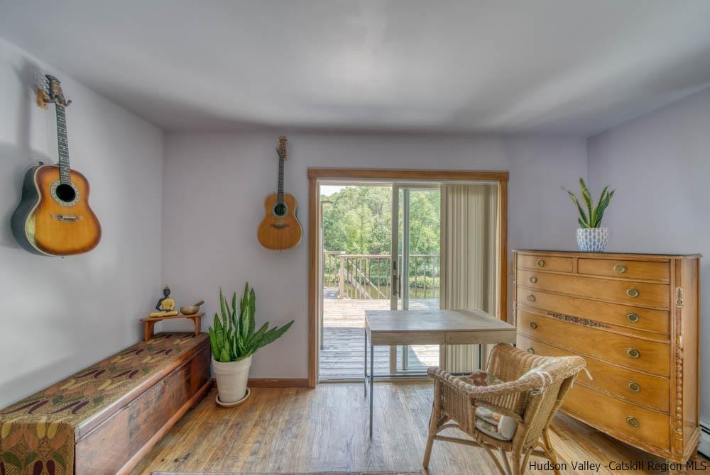 686 Berme Road High Falls, NY 12440 - Photo 10 of 23 a view of a dining room with furniture window and wooden floor
