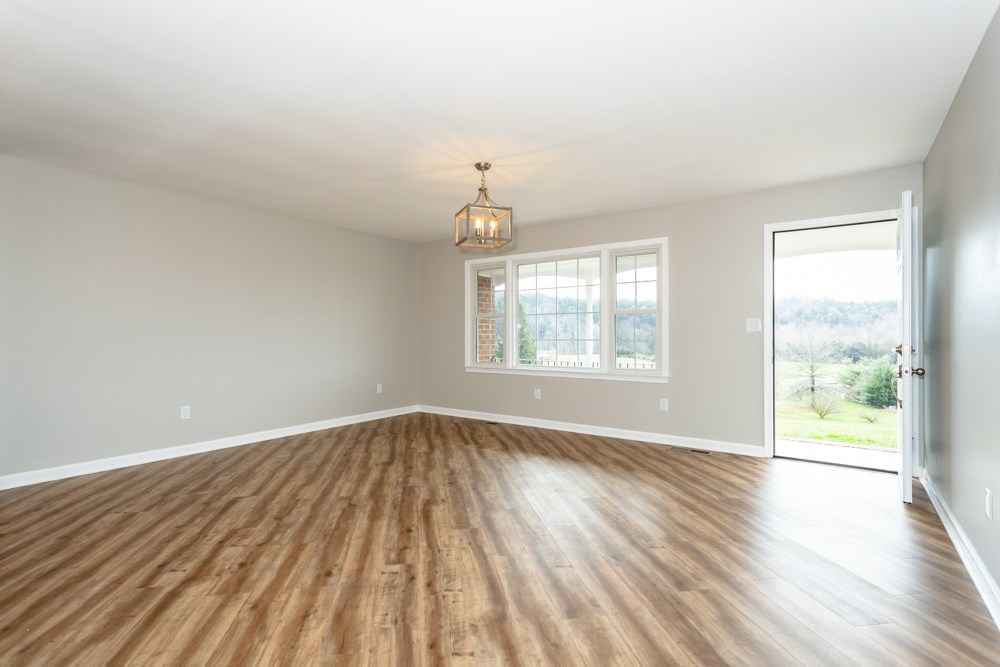 1469 Middle River Road Staunton, VA 24401 - Photo 5 of 50 wooden floor in an empty room with a window