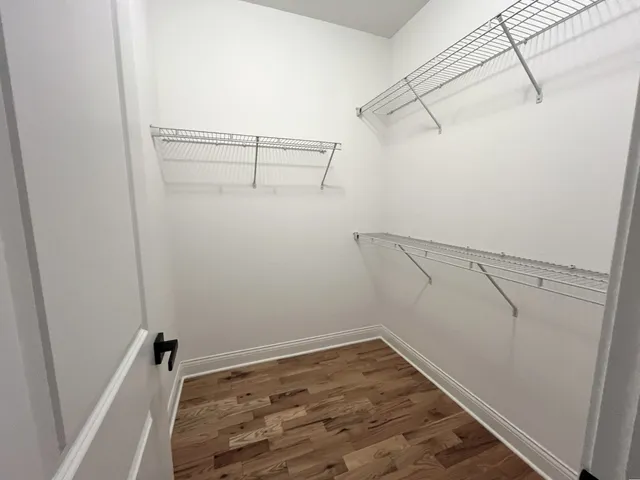 a view of a room with racks on the wall