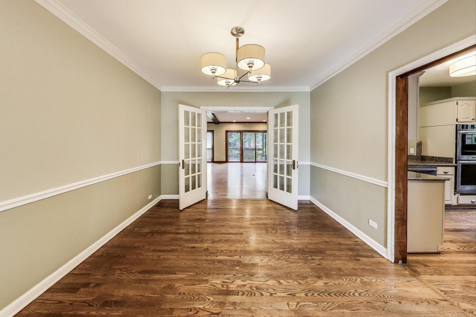 624 North Merrill Street Park Ridge, IL 60068 - Photo 3 of 37 wooden floor in an empty room with a window