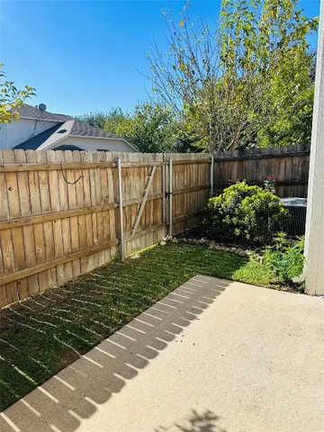 a garden view with a seating space