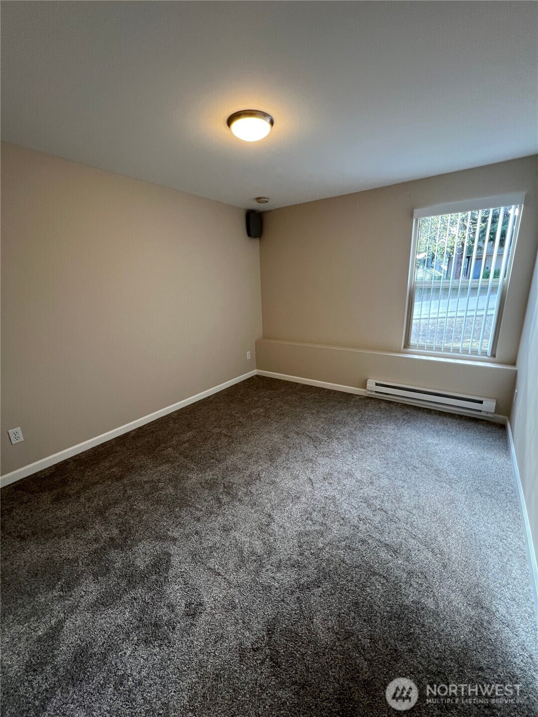3326 Lombard Avenue, Unit 3 Everett, WA 98201 - Photo 7 of 10 an empty room with a empty space and windows